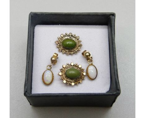 A pair of 9ct gold and opal earrings and a pair of 9ct gold and jade earrings 