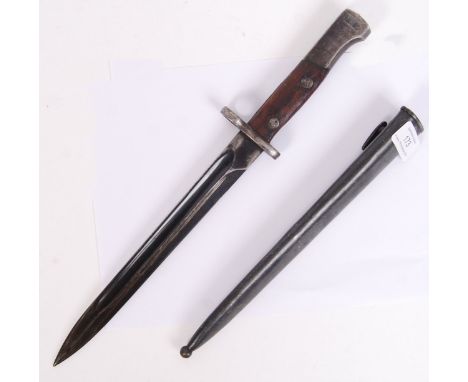 An original WWII Second World War AN1417 Yugoslavian M1948 rifle bayonet. ' 31355 ' marked on handle. Within its original sca