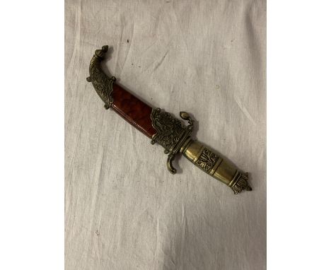 AN ORNATE SHEATHED MIDDLE EASTERN DAGGER 
