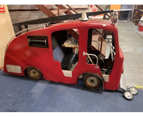 A STATIC FIRE ENGINE ORIGINALLY A FAIR GROUND RIDE, PART WAY THROUGH CONVERSION TO MOBILE ENABLEMENT  APPROXIMATELY 112CM X 2