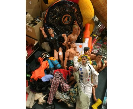 A LARGE COLLECTION OF ACTION MEN WITH CLOTHES AND TWO BOXED HARRY POTTER WANDS 