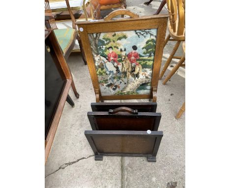 AN OAK FRAMED WOOLWORK FIRESCREEN AND TWO DIVISION MAGAZINE RACK 