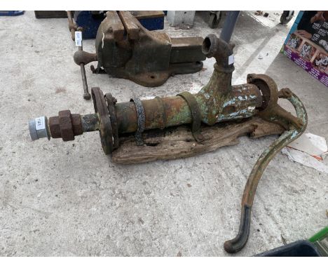 A VINTAGE CAST IRON WATER PUMP 