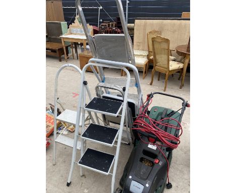 A GROUP OF FIVE STEP LADDERS AND A BOSCH LAWN MOWER 