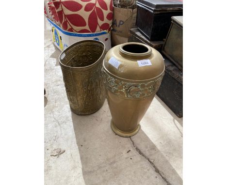 A DECORATIVE BRASS PLANTER AND A FURTHER BRASS VASE 