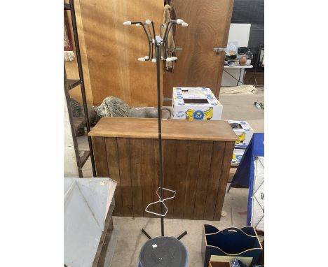 AN OVERTOOM STEP UP AND A METAL COAT STAND 
