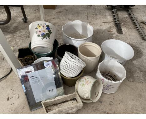 AN ASSORTMENT OF CERAMIC PALNTERS AND PLANT POTS ETC 