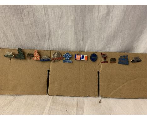 THIRTEEN RARE 1950s TOY TRAIN METAL PIN BADGES TO INCLUDE MARKLIN, TRIX EXPRESS ETC 