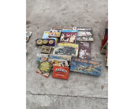 AN ASSORTMENT OF VINTAGE BOARD GAMES AND MODELING KITS 
