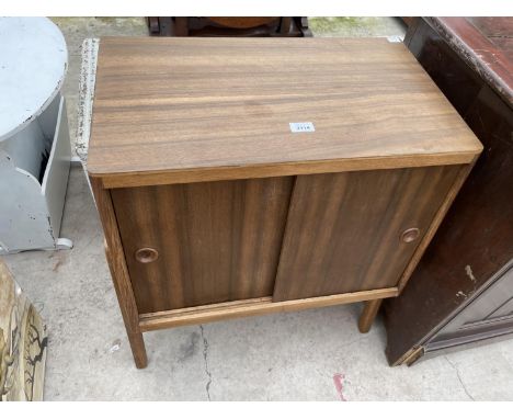 A VINTAGE HERBERT AND GIBBS (CATALOGUE NUMBER: 368, JOB 1935) SLIDING TWO DOOR RECORD CABINET WITH SIX ORIGINAL CLASSIFICATIO