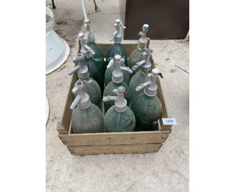 A GROUP OF TEN VINTAGE GLASS SODA SYPHONS 