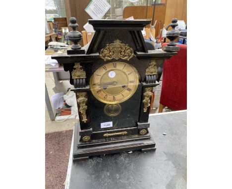 A DECORATIVE MANTEL CLOCK WITH GILT DETAILING 