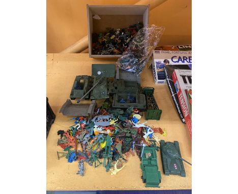 A LARGE QUANTITY OF ARMY VEHICLES AND SOLDIERS 