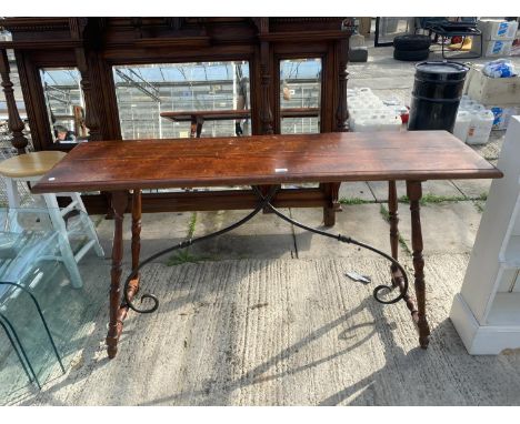 A MDOERN CONSOLE TABLE ON TURNED LEGS WITH CAST IRON STRETCHERS, 57" WIDE 