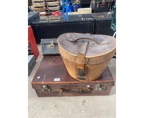 TWO VINTAGE TRAVEL CASES AND A FURTHER VINTAGE STORAGE CASE 