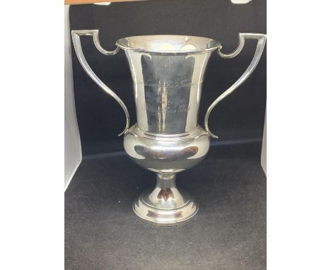 A GARRARD AND CO HALLMARKED LONDON 1922 SILVER POLO TROPHY. ENGRAVED "BALMER AND LAWRIE POLO TOURNAMENT 1924, WON BY THANZIE 