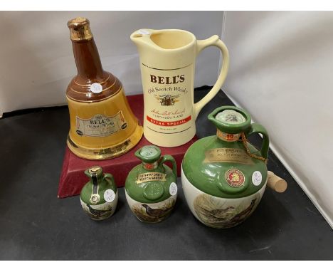 THREE SEALED RUTHERFORDS DELUXE SCOTCH WHISKEY JUGS, A BELLS WATER JUG AND AN EMPTY BELLS WHISKEY BELL SHAPED DECANTER 