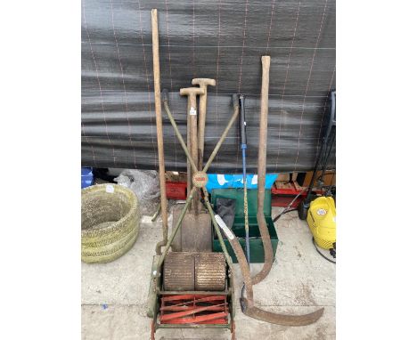 AN ASSORTMENT OF VINTAGE GARDEN TOOLS TO INCLUDE A WEBB MOWER, SPADES AND A SYTHE ETC 
