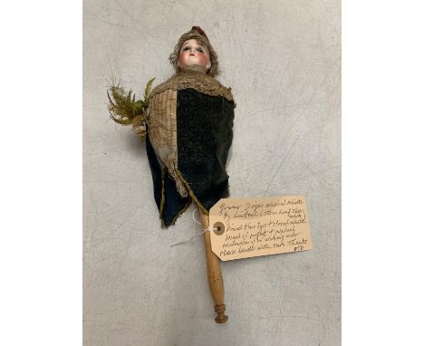 AN EARLY GERMAN BISQUE MUSICAL MAROTTE BY LIMBACH DOLL 