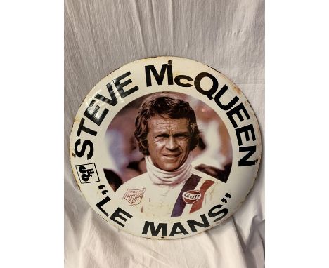 A LARGE ROUND ENAMEL 'STEVE MCQUEEN "LE MANS" ' SIGN DIAMETER 60CM 