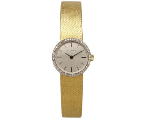 ETERNA DamenarmbanduhrElegante Uhr in Gelbgold 18K mit Lünette verziert mit Diamanten von zus. ca. 0,39 ct (lupenrein).Uhrwer