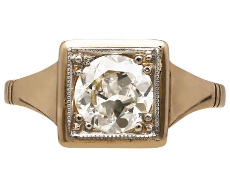 Solitär-RingLeuchtstarker Diamant-Ring in Gelbgold 14K mit Platin 950 Fassung.Blickfang ist ein modernisierter Altschliff-Dia