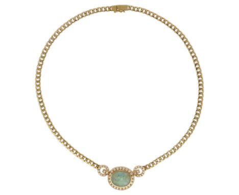 Opal-Brillant-SetElegantes Schmuckset, bestehend aus Collier und Armband in Gelbgold 18K.Collier mit Edelopal-Cabochon von ca