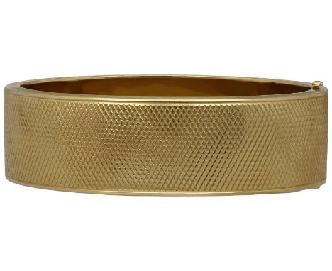 Gold-ArmspangeZeitlos elegantes Schmuckstück in Gelbgold 14 K.Armspange mit Rauten-Muster auf der Vorderseite und Schnappschl