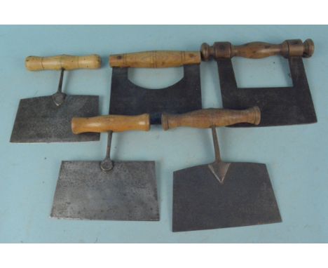 Five assorted vintage steel and wooden handled pastry cutters