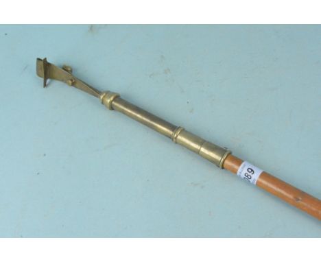 A 19th Century brass lamp lighters wand, the screw on end section housing the wick