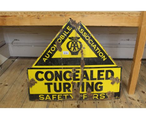 A vintage Automobile Association yellow enamel road sign featuring 'Concealed Turning, Safety First', 66cm x 54cm