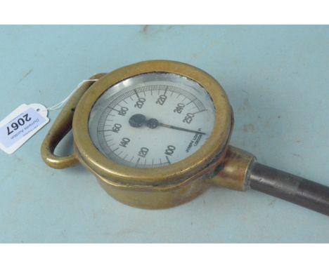 A 19th Century brass and copper country house kitchen thermometer for large pans, the round dial with temperature dial for 10