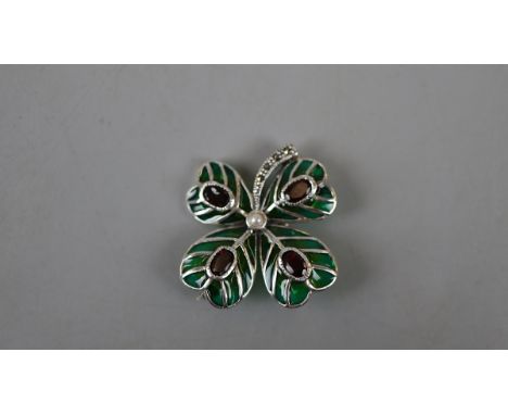 Silver enamel and garnet clover brooch 