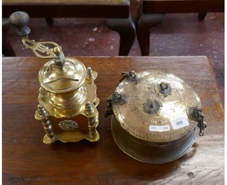 Brass coffee grinder together with brass Indian cooking pot for chapati 