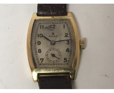 A Vintage 18carat gold gents Rolex watch circa 1938 with a rectangular wide edge dial with second subsidiary dial 15 jewel ma