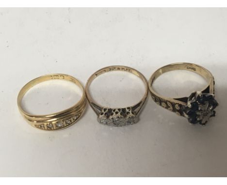 Three gold rings set with diamonds and sapphire one 18carat (3)