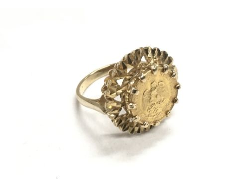 A 9ct gold Mexican coin ring, approx 6.3g and approx size K.