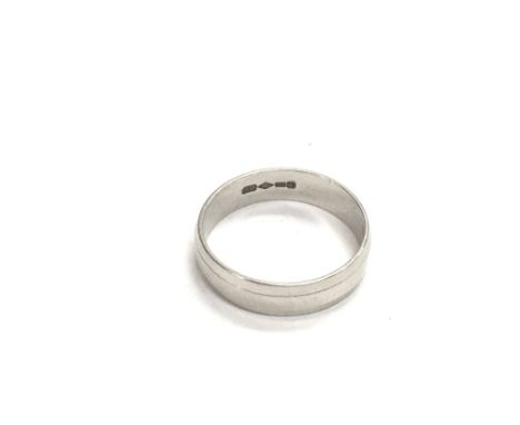 A platinum ring marked 950, approx 3.7g and approx size K.