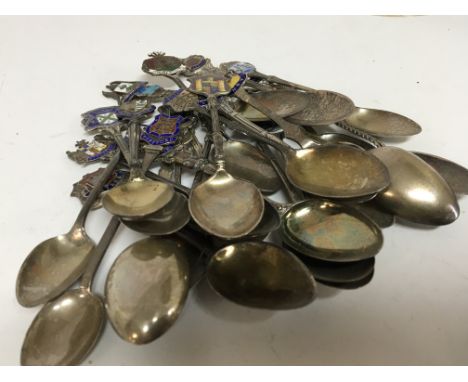 A collection of silver and enamel spoons depicting coats of arms of towns and city (a lot) 326g