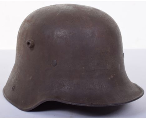 M.16 Steel Combat Helmet, an untouched plain apple green model 1916 helmet of large size, shell marked ‘ET66’. Virtually all 