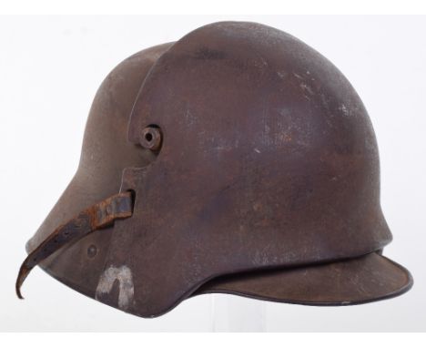 M.16 Steel Helmet with Original Snipers / Machine Gunners Brow Plate, a possibly unique M.16 trench helmet with its original 