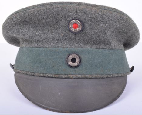Prussian Private Purchase M.17 Cap, excellent late war cloth, good colour and field grey painted peak. Ersatz sweatband is co