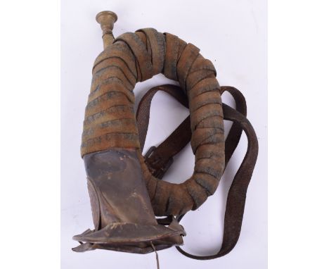 Saxon Battle Damaged Field Bugle, an evocative battle damaged Saxon bugle, wrapped in original cloth, complete with chain att