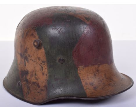 M.16 Camouflaged Battle Damaged Steel Combat Helmet, superb camouflage finish in plum, ochre and green without black separati