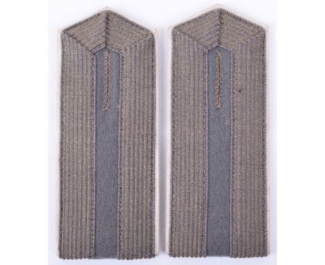 M.15 NCO’s Slip-On Shoulder Boards, in field grey with white piping and tress to the top of the boards. Complete with the fie