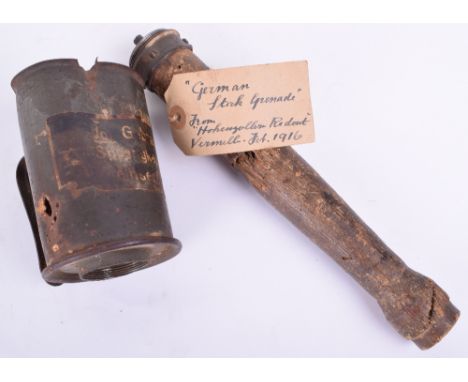 Battle Damaged Inert Stick Grenade, complete with bring back label, which reads ‘German stick grenade from Hohenzollern Redou