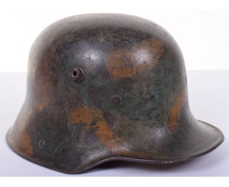 M.17 Camouflage Steel Combat Helmet, this unusual camouflage pattern, shell size marked ‘SI 66’, two of the original three li