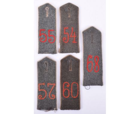 5x M.15 Single Field Grey Tunic Shoulder Boards, all being white piped examples with red chain stitched numerals to the centr