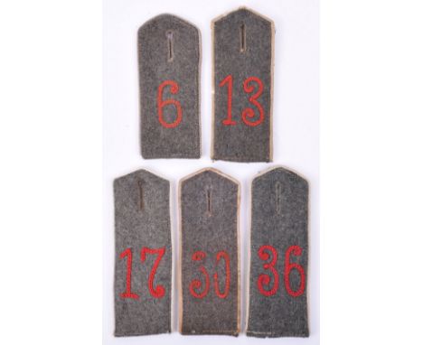 5x M.15 Single Field Grey Tunic Shoulder Boards, all being white piped examples with red chain stitched numerals to the centr