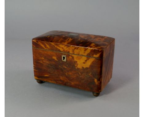 A Victorian rectangular tortoiseshell and pewter strung tea caddy, the domed top inset with vacant cartouche, with white meta